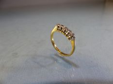 18ct GOLD five diamond ring size J.5