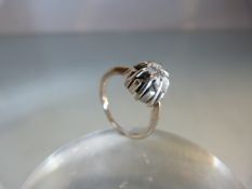 White Gold single stone diamond ring (size I) of approx 30 points on a raised column setting