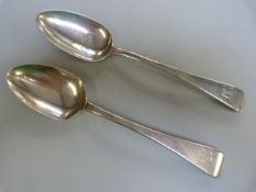 Pair of Hallmarked Silver George III serving spoons by Thomas Dicks of London. Monogrammed to front.