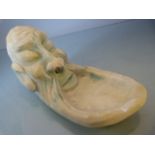 Comical Ashtray poss Alabaster in the form of an oriental man. His Beard being the tray.