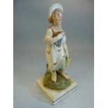 Staffordshire pearlware 19th century figure of a lady collecting flowers mounted on square base.
