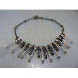 White metal (possibly Foreign Silver) and Haematite Cleopatra Fringe Necklace: Consisting of 12