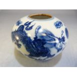 Chinese Blue and White small vase depicting a pair of dragons contesting the flaming Pearl. Two