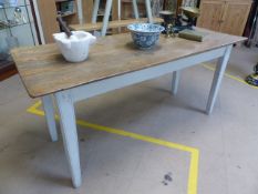 Long antique pine table with painted legs