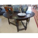 Antique oak 'Coffin' type drop leaf table