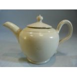 Creamware miniature teapot and cover. Large loop handle. Damage to underside of cover