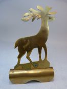 Brass adornment - in the form of a deer.
