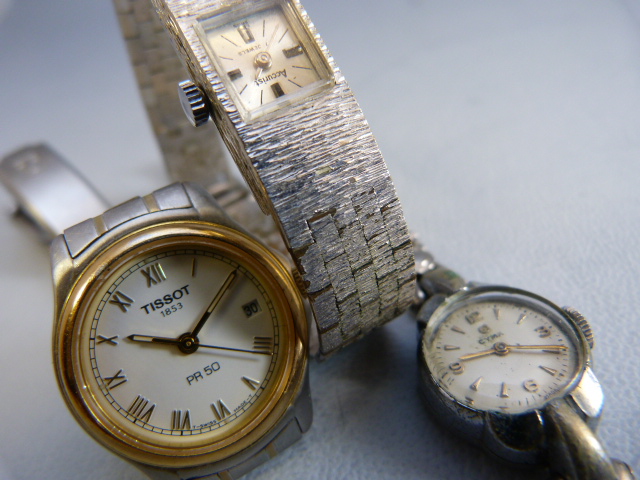 Three ladies silver coloured metal wrist watches. Two dress watches A/F by Accurist & CYMA and a - Image 9 of 9