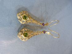 Pair of Silver and Gilt drop earrings set with Amethyst and Peridot