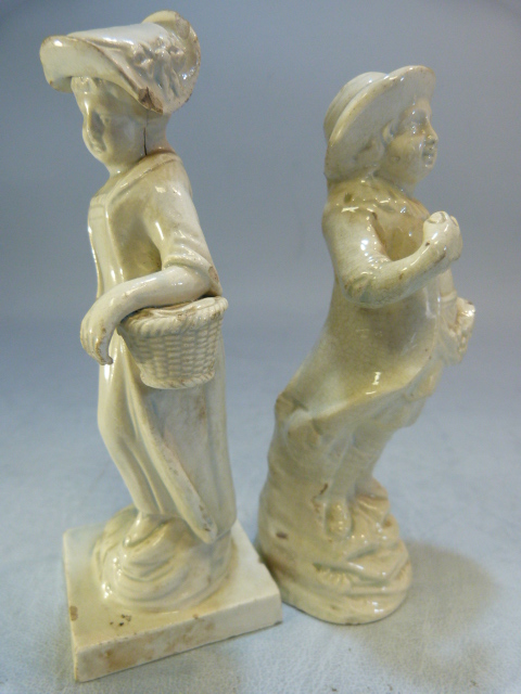 Two Staffordshire pottery 'Blanc de Chine; figures modelled as a large man carrying grapes and a - Image 2 of 18