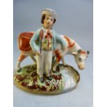 Early 19th Century staffordshire figure group of a boy and his cow, one hand on the cow shoulder,