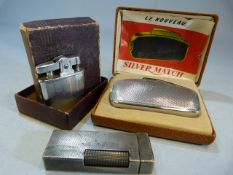 Three Vintage Lighters: A boxed French "le nouveau Silver Match"; a boxed Ronson "Princess" and a