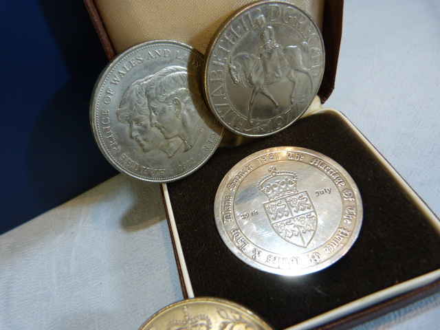 Three silver crowns, along with a hallmarked silver coin commemorating the marriage of the Prince of - Image 3 of 4