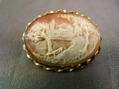 Vintage 9ct Gold Cameo brooch measuring approx: 35.24mm x 45mm across. The Pastoral scene is of a