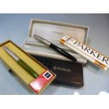 Two boxed and original Parker Pens, a Parker 45 medium Olive & a Parker 51