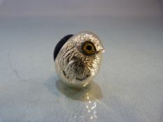 Silver pin cushion in the form of a chick with glass eyes