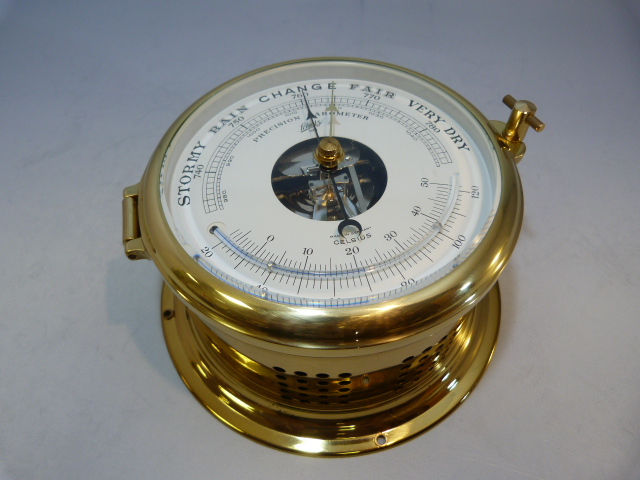 Brass 'Schatz' Ships clock with open dial.