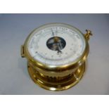 Brass 'Schatz' Ships clock with open dial.