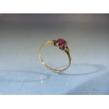 18ct Gold ladies ring set with a single Ruby stone