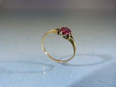 18ct Gold ladies ring set with a single Ruby stone