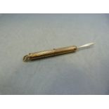 A 9ct gold propelling tooth pick, 5.7g maker R&R