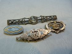 Four silver brooches to include a sweetheart brooch and an enamelled brooch and a sailing ship by