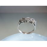 18ct White Gold three stone Diamond ring of approx 85 points (size K.5)