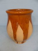 Oversized French Terracotta garden planter with a brown salt glaze dripping from Rim