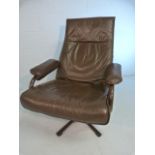 Danish leather reclining swivel chair marked KEBE