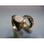 Two hallmarked silver rings - 1 set with moonstone. Approx weight - 8.8g
