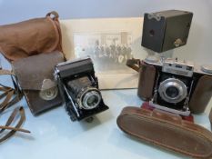 Three vintage cameras and a vintage masonic photograph