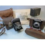 Three vintage cameras and a vintage masonic photograph