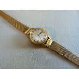 A LADIES YELLOW GOLD WRISTWATCH, the round dial inscribed "Certina", attached to an 18ct yellow gold