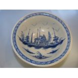 Pearlware bowl of large form painted in Underglaze blue with fence pattern rim. Decorated to outside