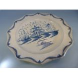 Liverpool Pearlware blue and white plate with applied draping in the Pagoda design.