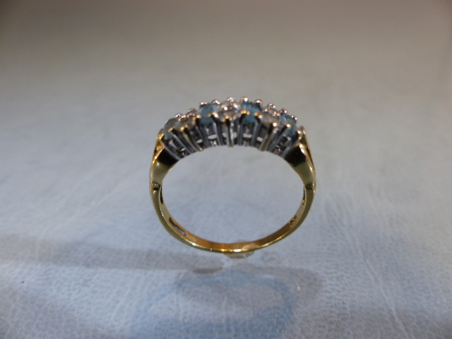 9ct GOLD half Eternity ring set with blue Topaz stones. Size M.5 - Image 7 of 9
