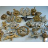Selection of 21 various cap badges