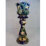 Majolica Jardiniere on stand marked OXFORD 2s to base. Floral trailing on a dark blue ground.