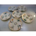 Set of six Famile Vert plates with red character marks to bases