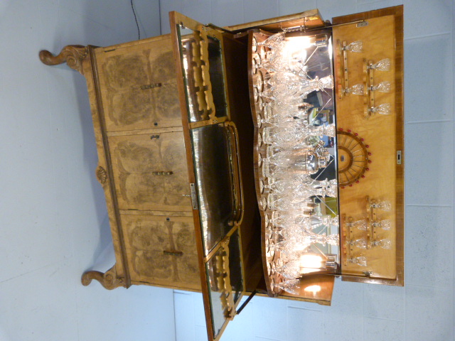 Art Deco walnut cocktail cabinet with drop front above two cupboards. Opens to reveal mirrored light - Image 13 of 25