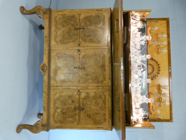 Art Deco walnut cocktail cabinet with drop front above two cupboards. Opens to reveal mirrored light - Image 7 of 25