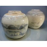 Two Early blue and White stoneware glazed ginger vases (no covers). Decorated with coastal scenes.
