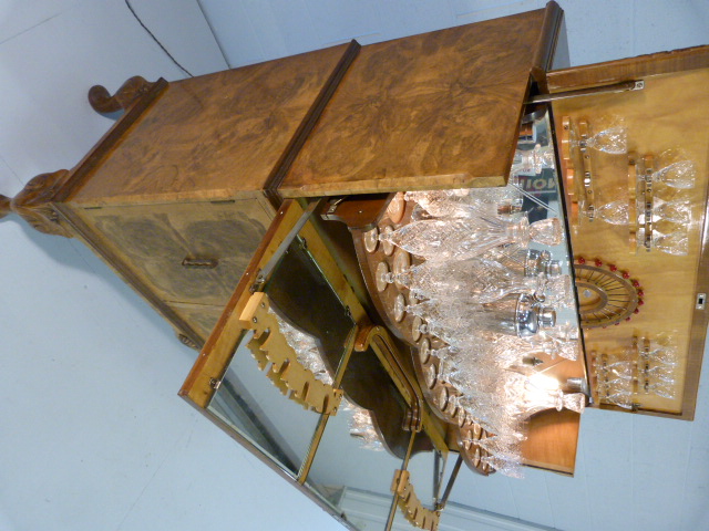 Art Deco walnut cocktail cabinet with drop front above two cupboards. Opens to reveal mirrored light - Image 8 of 25