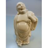 Chinese blanc de chine figure (possibly of Luohan) approx 18cm in height four character mark to