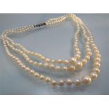 3 string graduated Cultured pearl necklace with silver Marcasite clasp. Shortest Row approx 16.