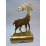 Brass adornment - in the form of a deer.