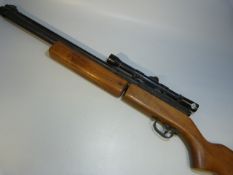 A .22 pump action Sharp Innova air rifle with 4 X 20 scope (rifle as found) Note: Purchaser must