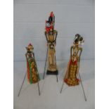 Three Indonesian articulated puppets on stands