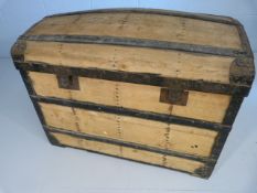 Oversized dome topped pine trunk with metal strapping and banding