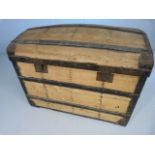 Oversized dome topped pine trunk with metal strapping and banding